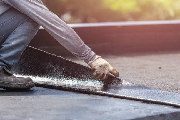 Professional Emergency Waterproofing technician working in Dowling, MI